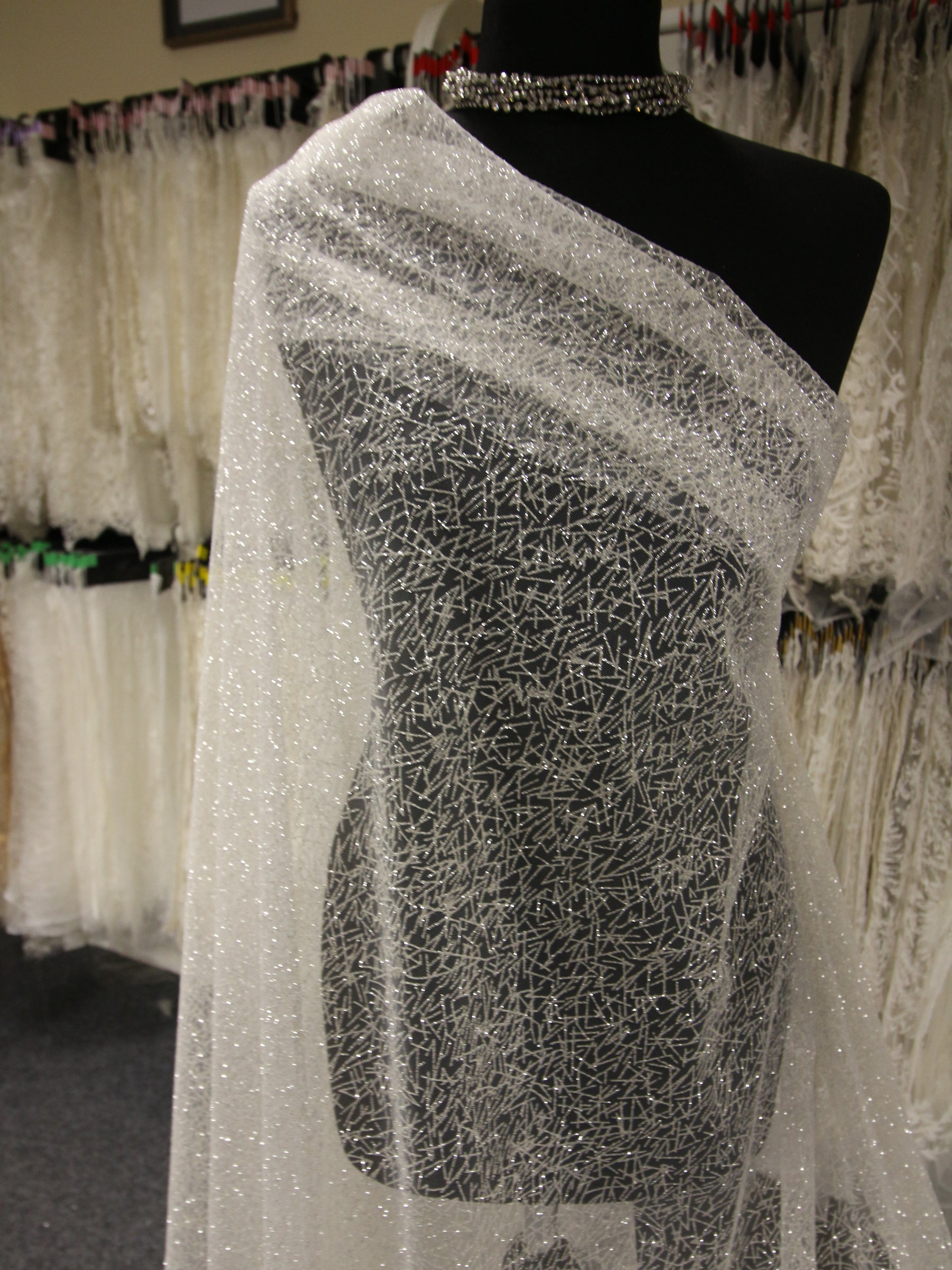 Elfenbeinfarbener Glitzertüll - Kavallerie