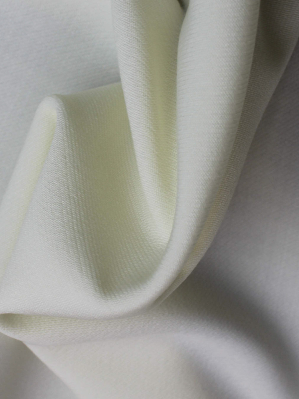 Elfenbeinfarbener Stretch-Krepp aus italienischer Wolle – PH4002