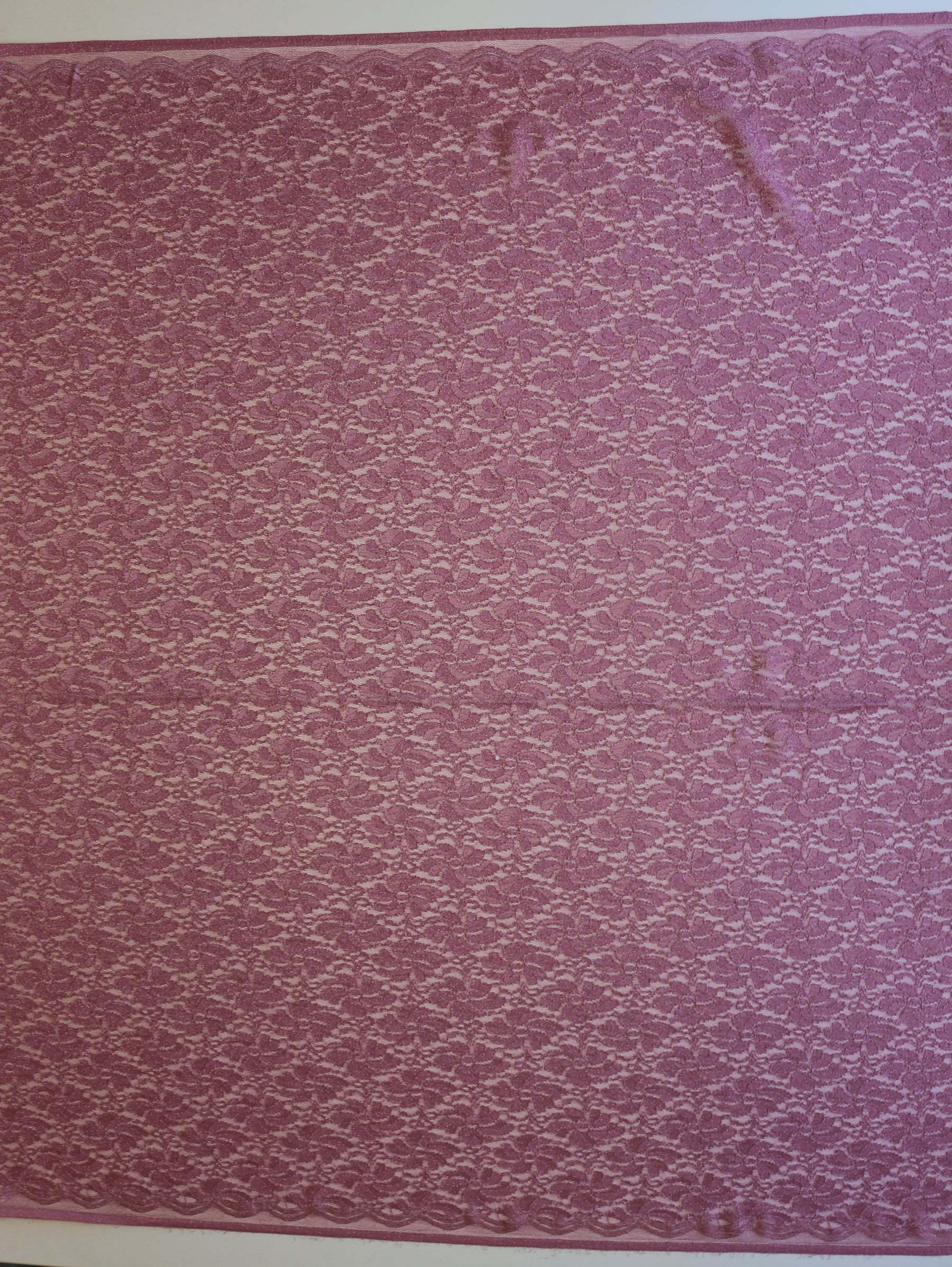 Rosa Stretch-Spitze – Rechtfertigung