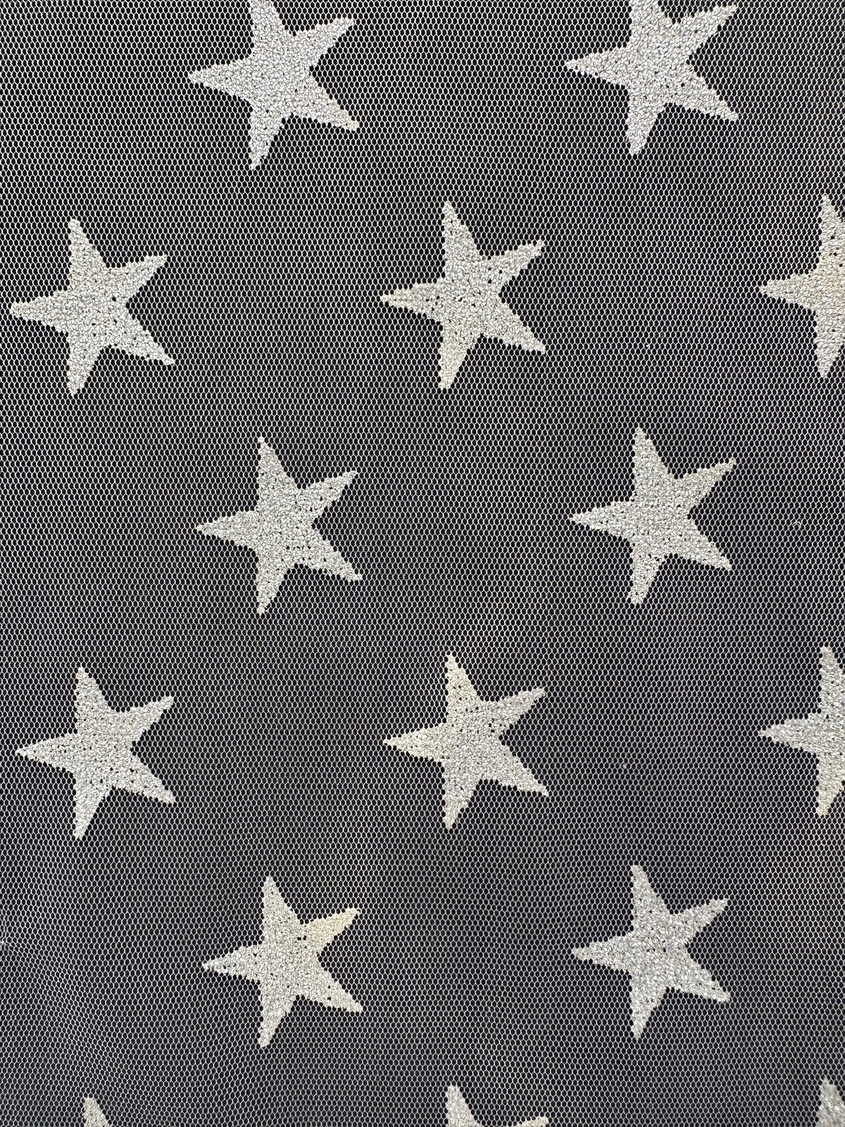 Elfenbeinfarbener, mit Sternen verzierter Tüll – Magie