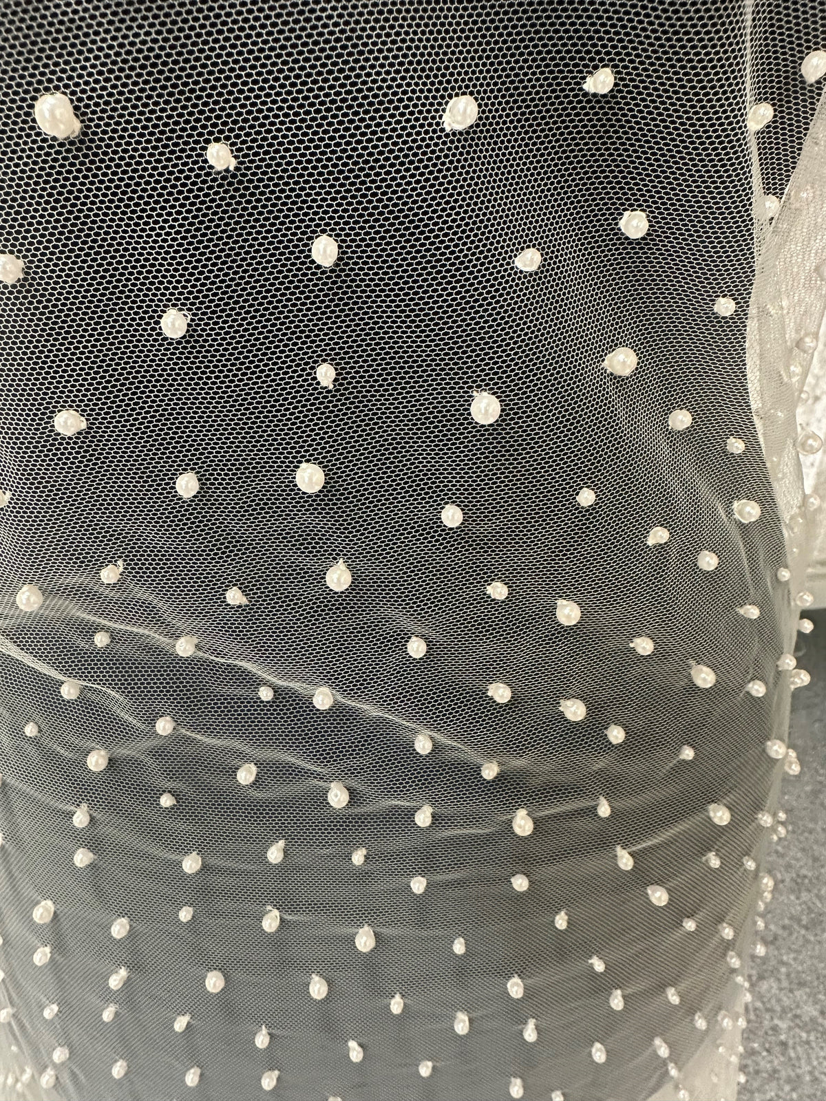 Elfenbeinfarbener Perlentüll – Folly