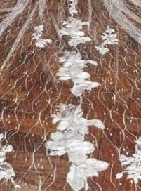 Elfenbeinfarbene Raschelspitze – Stream