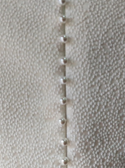 Elfenbeinfarbener Jacquard-Punktstoff – Joviality