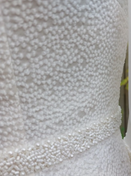 Elfenbeinfarbener Jacquard-Punktstoff – Joviality