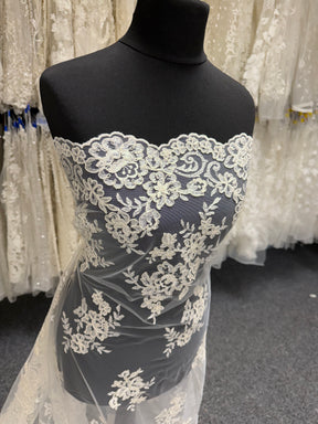 Elfenbeinfarbene, unbestickte Kordelspitze - Naomi (CF)