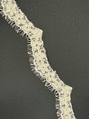 Elfenbeinfarbene Paillettenborte - T684