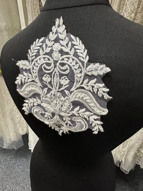 Elfenbeinfarbene Perlenspitzenapplikation – Anarchie