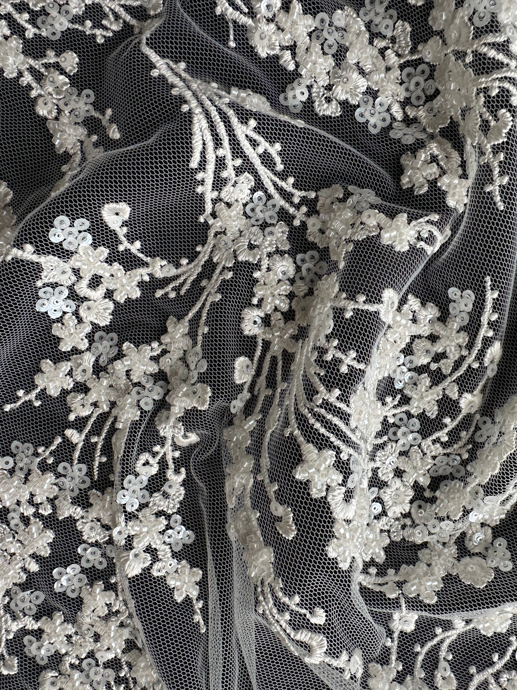 Elfenbeinfarbene, verzierte Stickspitze – Jazz