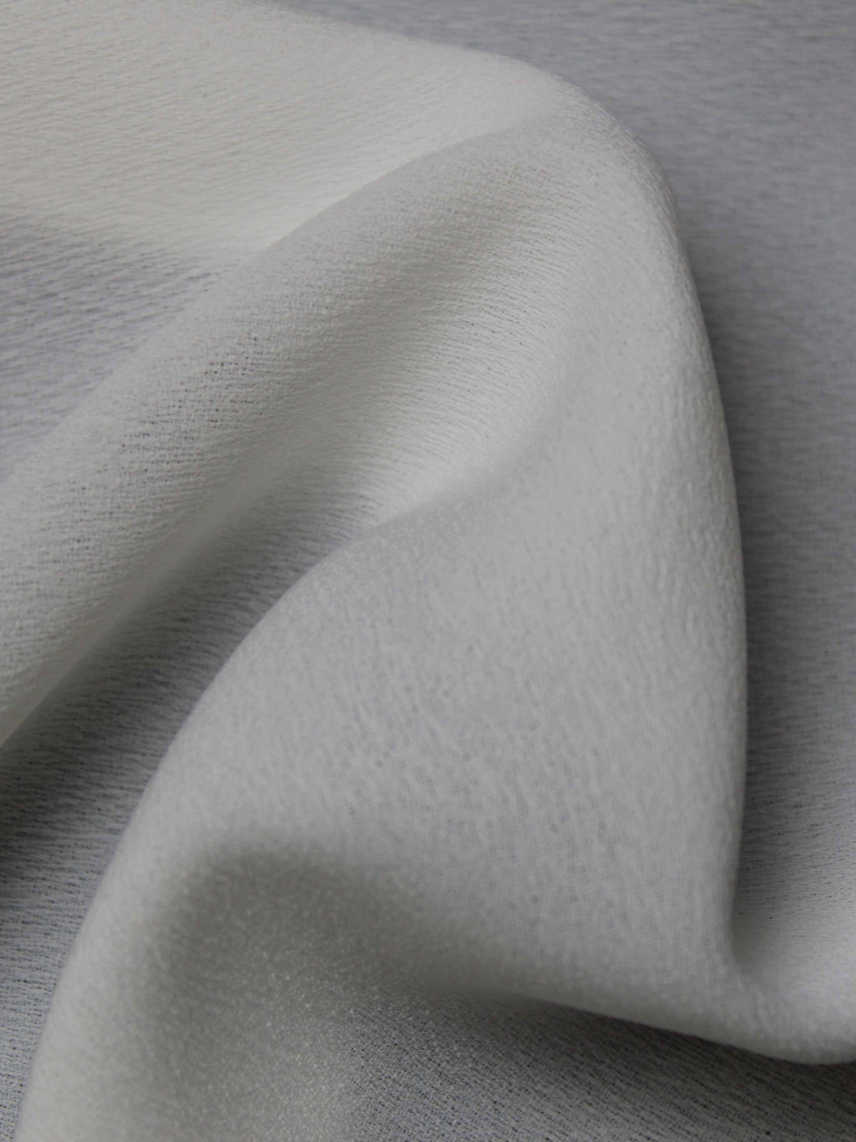 Elfenbeinfarbene Poly-Georgette - P62