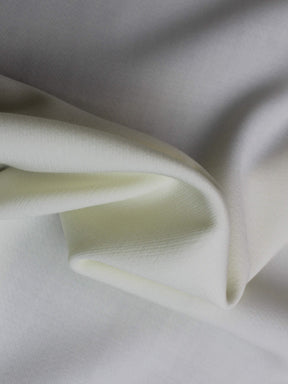 Elfenbeinfarbener Stretch-Krepp aus italienischer Wolle – PH4002