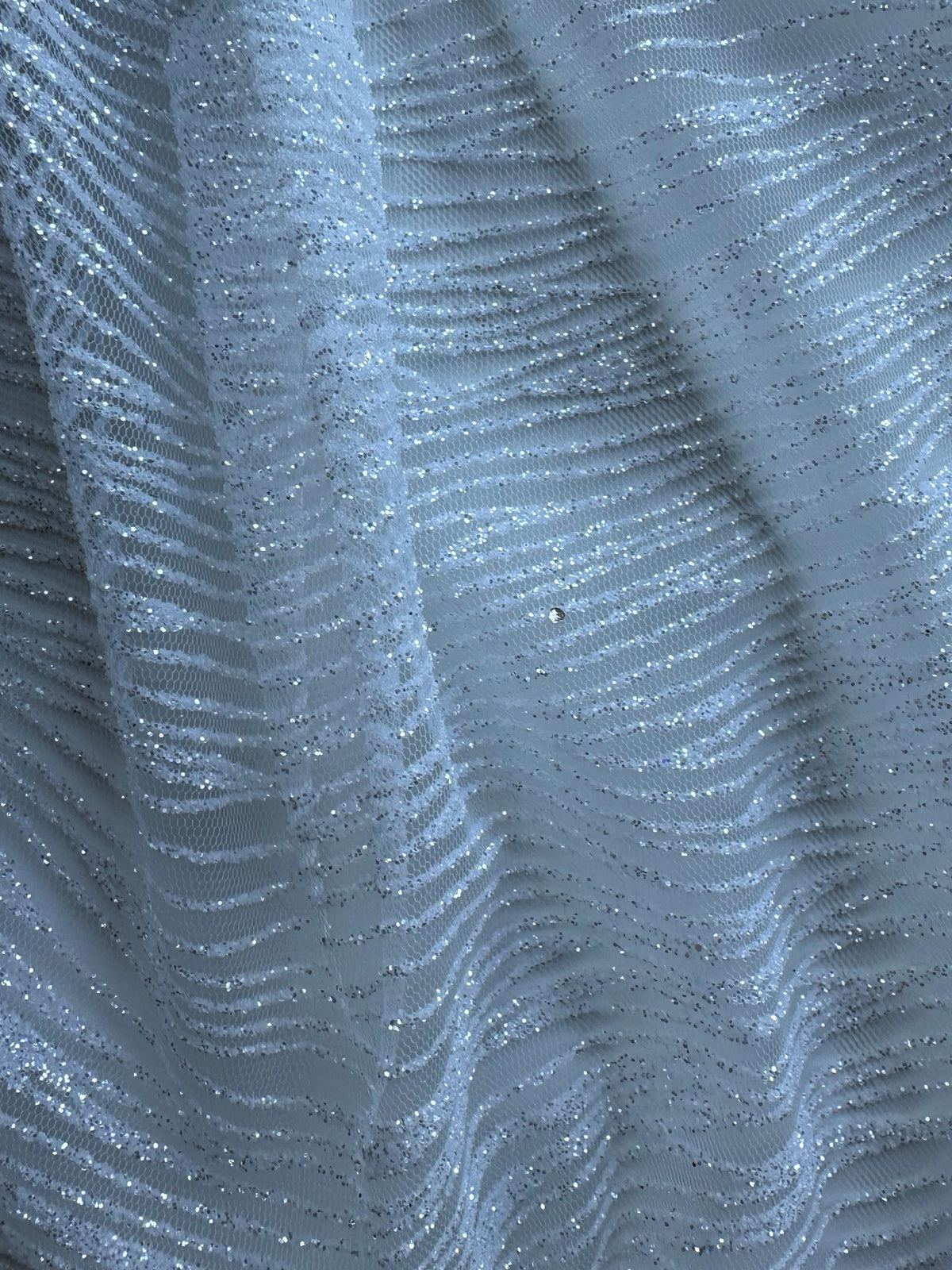 Elfenbeinfarbener Glitzertüll – Ripple