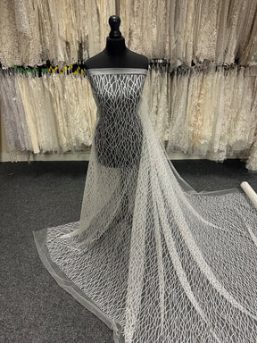 Elfenbeinfarbener Glitzertüll – Sparta