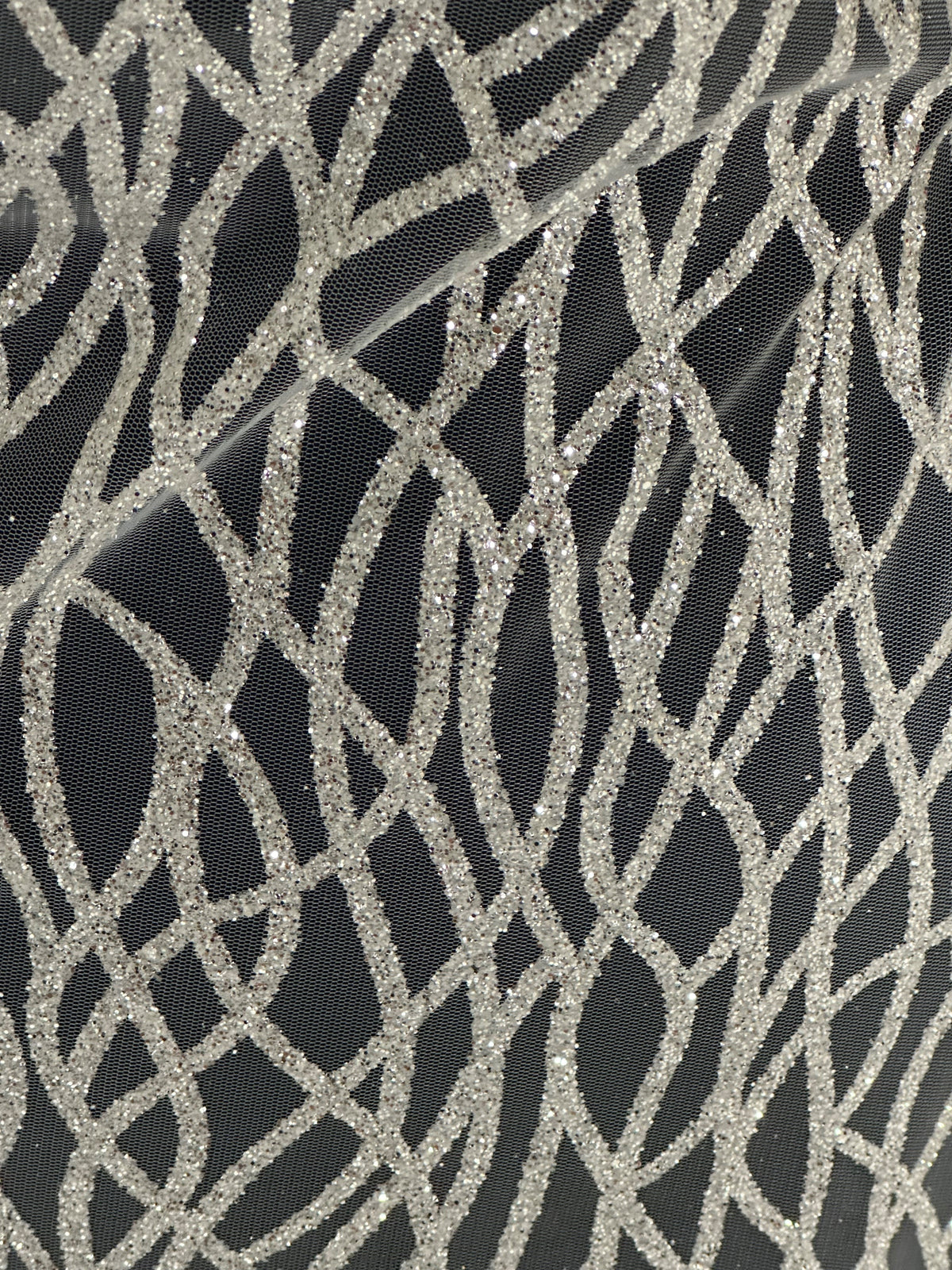 Elfenbeinfarbener Glitzertüll - Lächeln