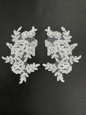 Elfenbeinfarbene Perlenspitzenapplikationen - Geräusch