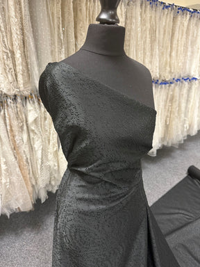 Schwarzer Jacquard-Stoff mit Punkten – Glee