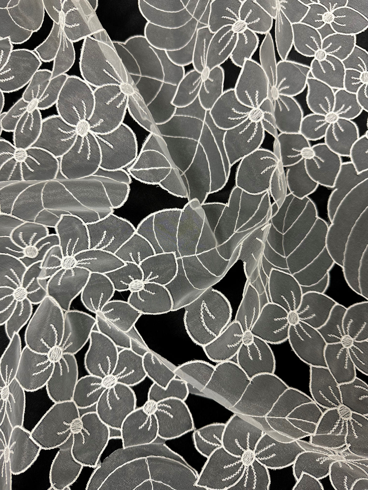 Elfenbeinfarbene Organzaspitze – Fähigkeit