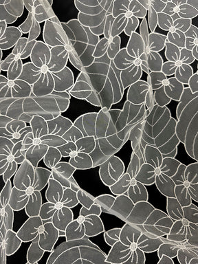 Elfenbeinfarbene Organzaspitze – Fähigkeit