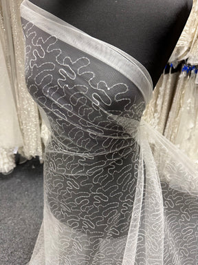 Elfenbeinfarbener Pailletten-Tüll im Mäandermuster - Aplomb