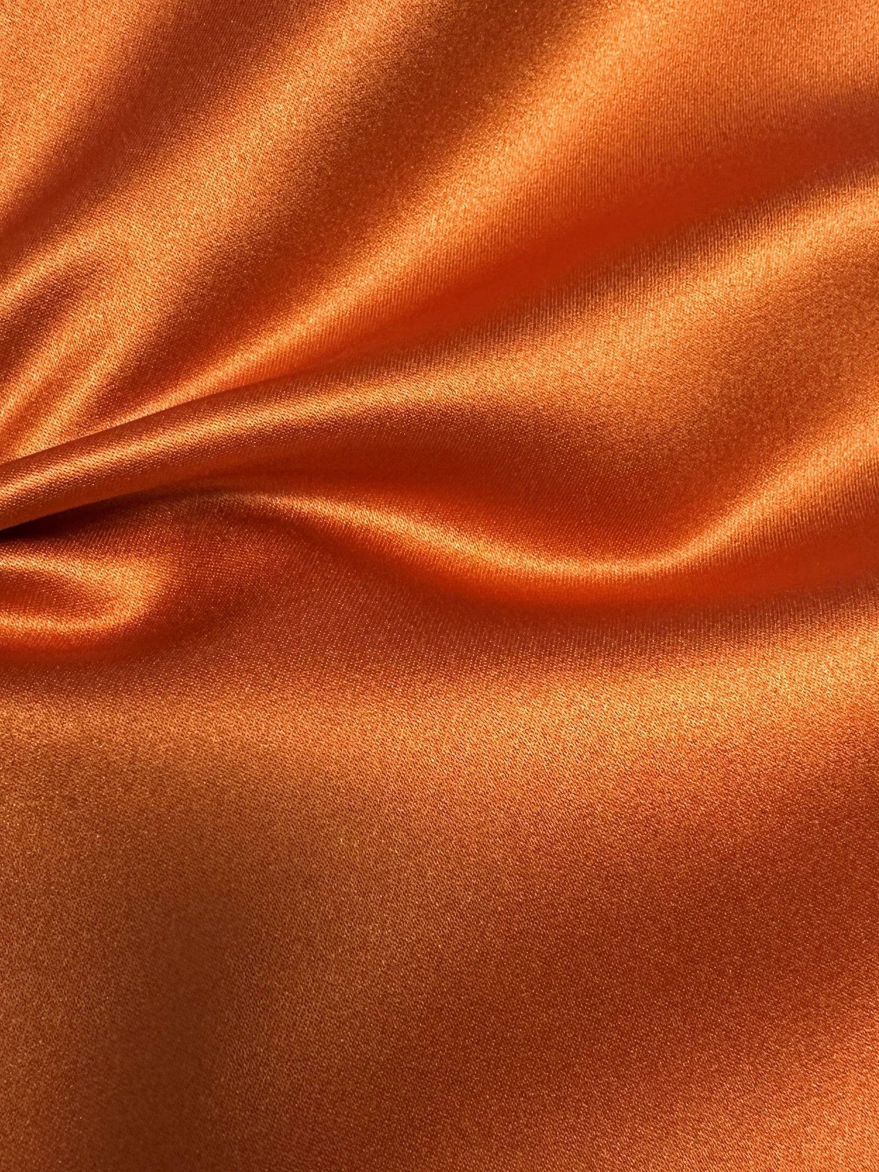 Gebrannter orangefarbener Polyester-Satin – Kanada