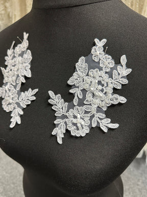 Elfenbeinfarbene Perlenspitzenapplikationen - Geräusch