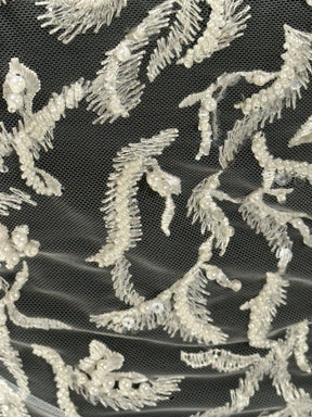 Kissen aus elfenbeinfarbener Perlenstickerei