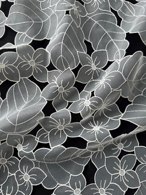 Elfenbeinfarbene Organzaspitze – Fähigkeit