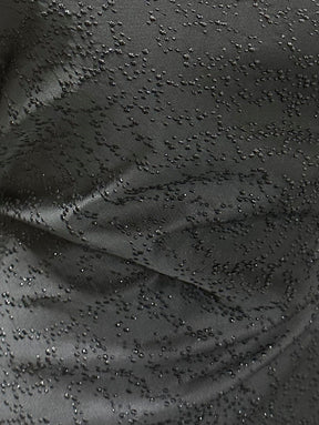 Schwarzer Jacquard-Stoff mit Punkten – Glee