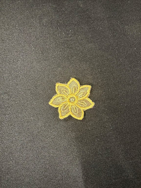 Goldenes Gänseblümchenmotiv mit Swarovski-Kristallen – Aladdin