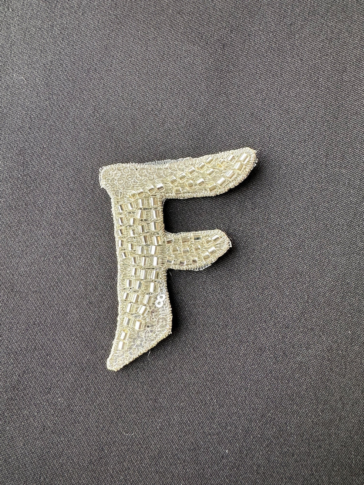 Perlenbuchstabe F