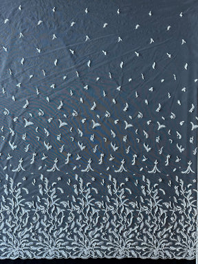 Kissen aus elfenbeinfarbener Perlenstickerei