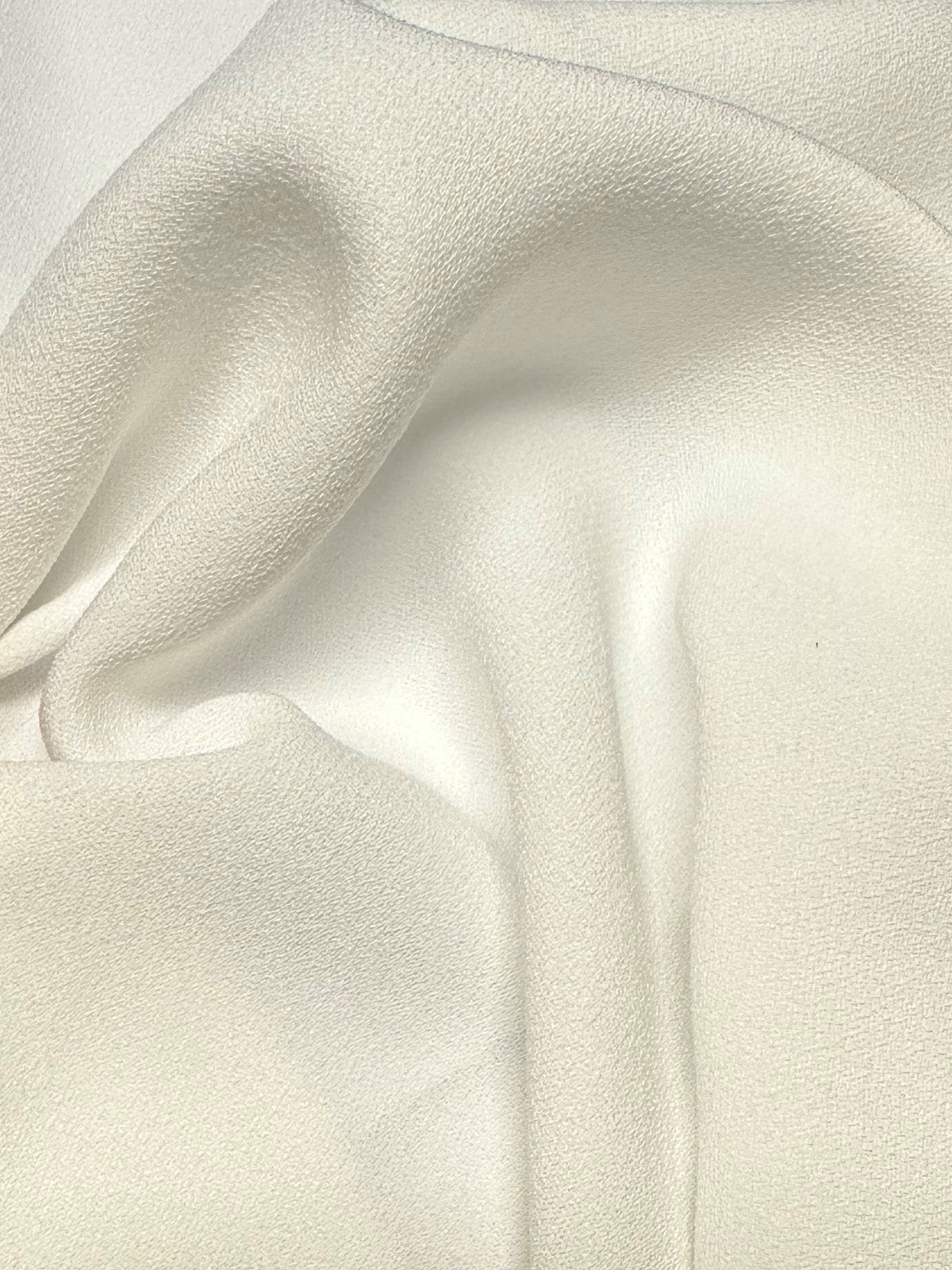 Elfenbeinfarbener Polyester-Stretch-Krepp – Prowess